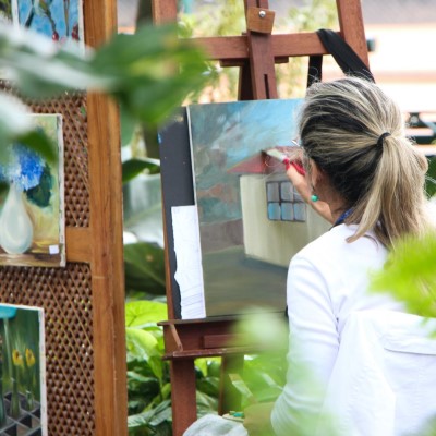 Creating Art - Sandra Burns ART - painting outdoors in the courtyard surrounded by fresh air and plants, listening to the local birdlife.